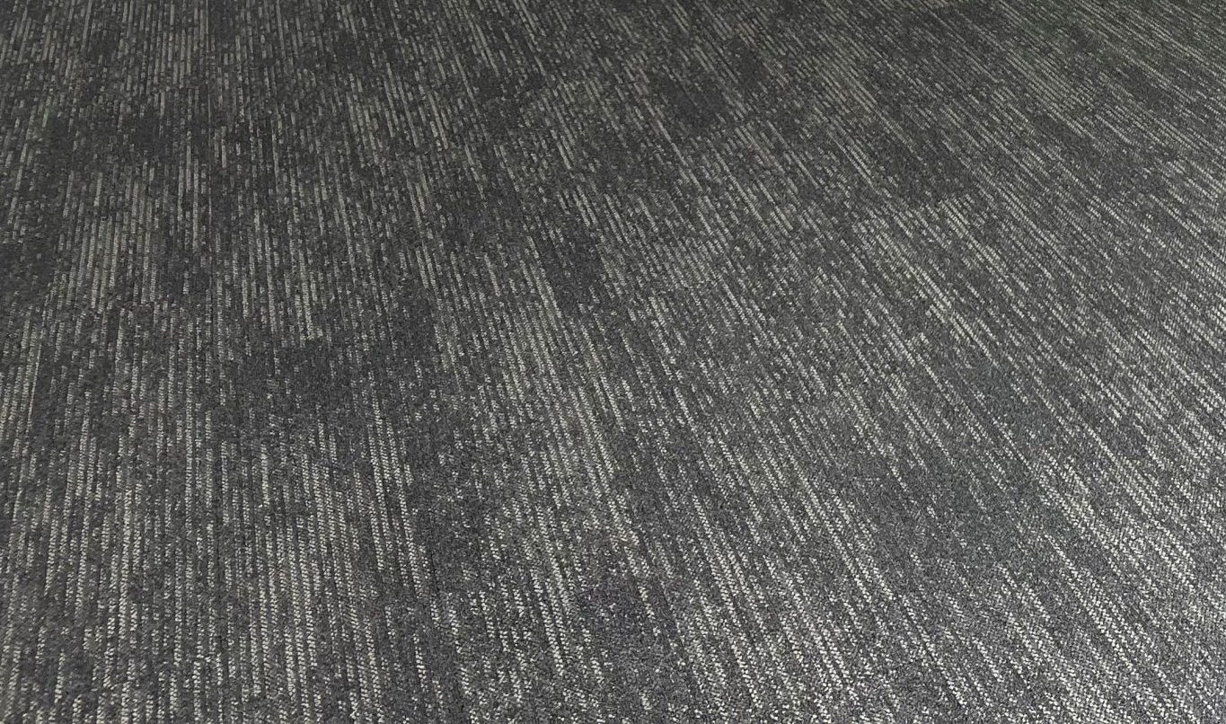 Commercial carpet tiles installed in an office